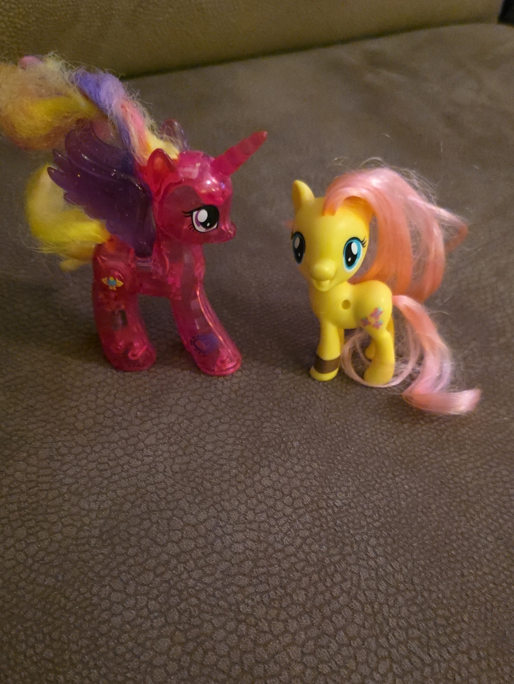 My Little Pony Pink Translucent Unicorn & Yellow Fluttershy Figures